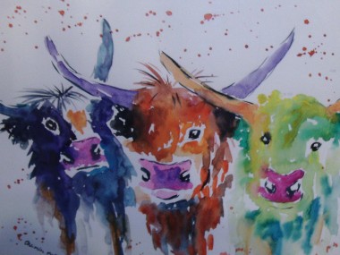 three colourful abstract cows
