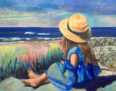 Girl sitting at the Beach