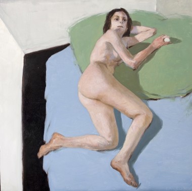 Woman on a Couch in Light Blue Room