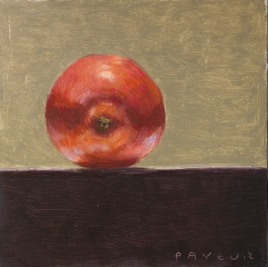 Red apple on ocher background