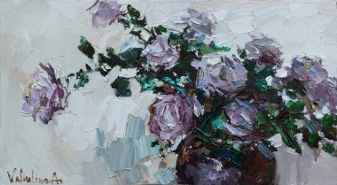 Purple roses in a vase 