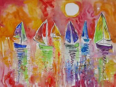 colourful sailing boats in a sunset sky