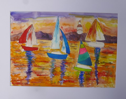 Colourful Sailing Boats in a Bright  Sunset Sky
